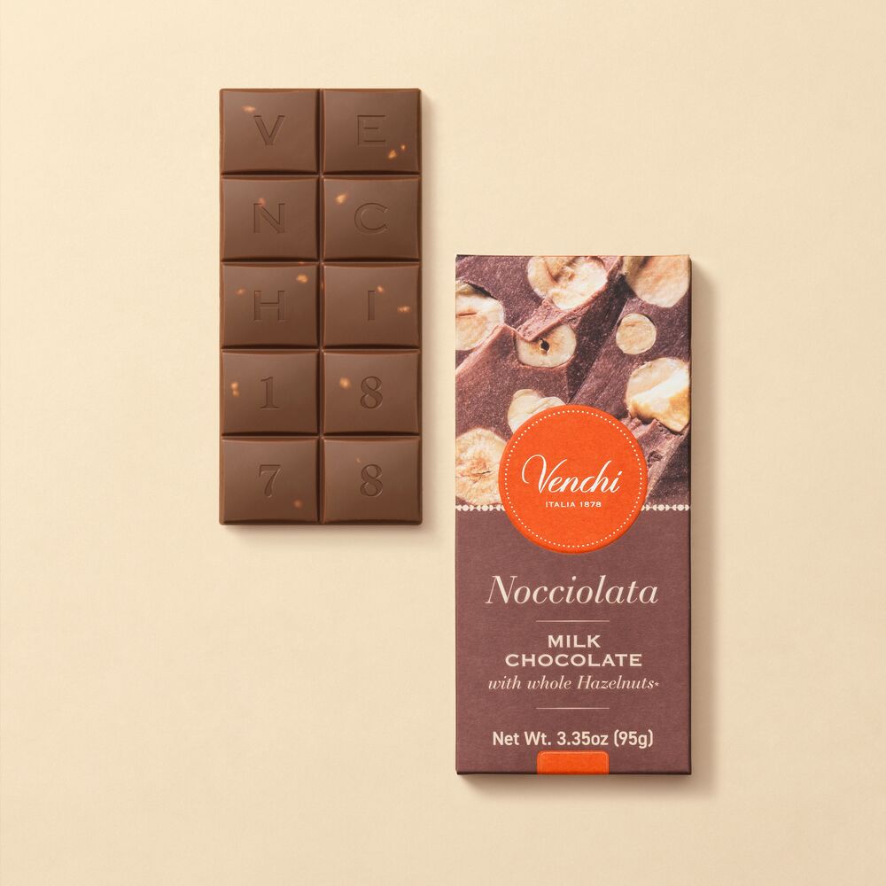 A bar of milk chocolate with whole hazelnuts. Product created using only Piedmont hazelnuts. Naturally gluten free. Buy now!