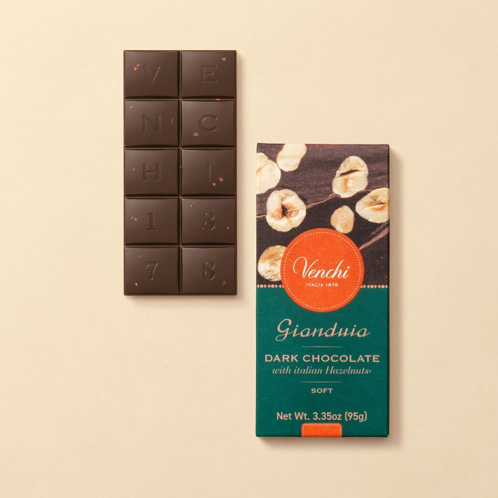 Dark Hazelnut Gianduja Bar a taste explosion in a perfect balance between creamy dark Gianduja and crunchy whole Piedmont Hazelnuts. Buy online!