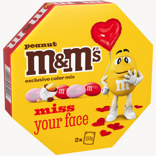 Milk chocolate (48%) covered peanuts (24%) in a sugar shell.