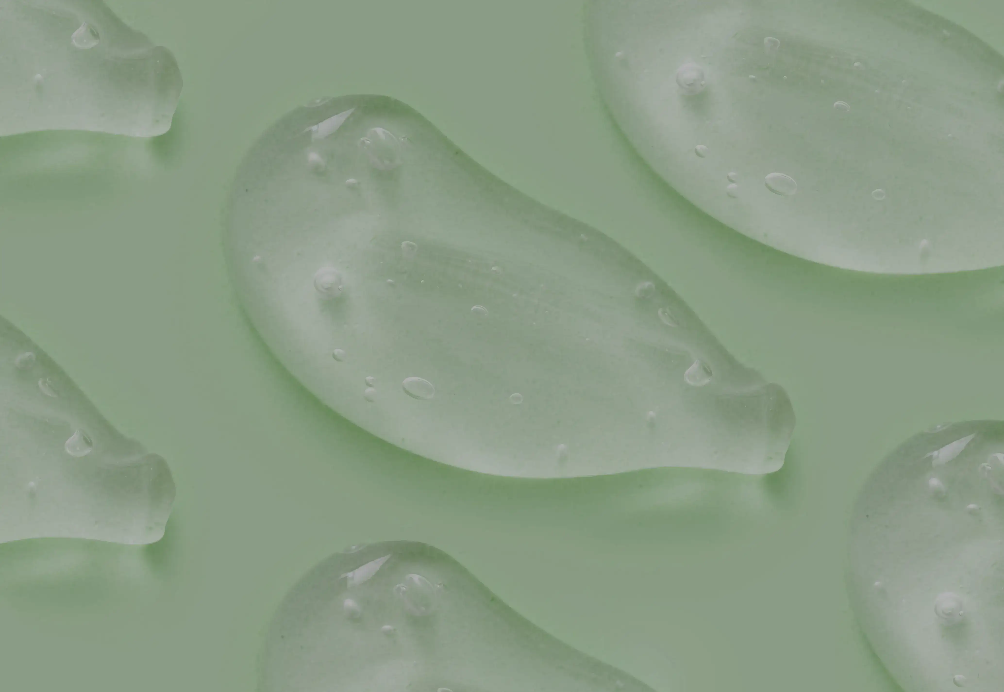 pattern-drop-of-serum-gel-cosmetic-essence-on-a-li-2023-11-27-04-55-42-utc.webp