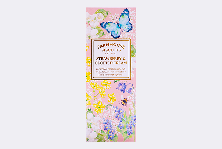 Strawberry clotted cream biscuits in English garden carton