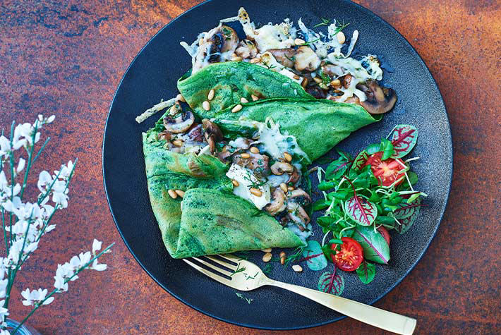 Spinach Crêpes Filled with Goats Cheese and Garlic Mushrooms