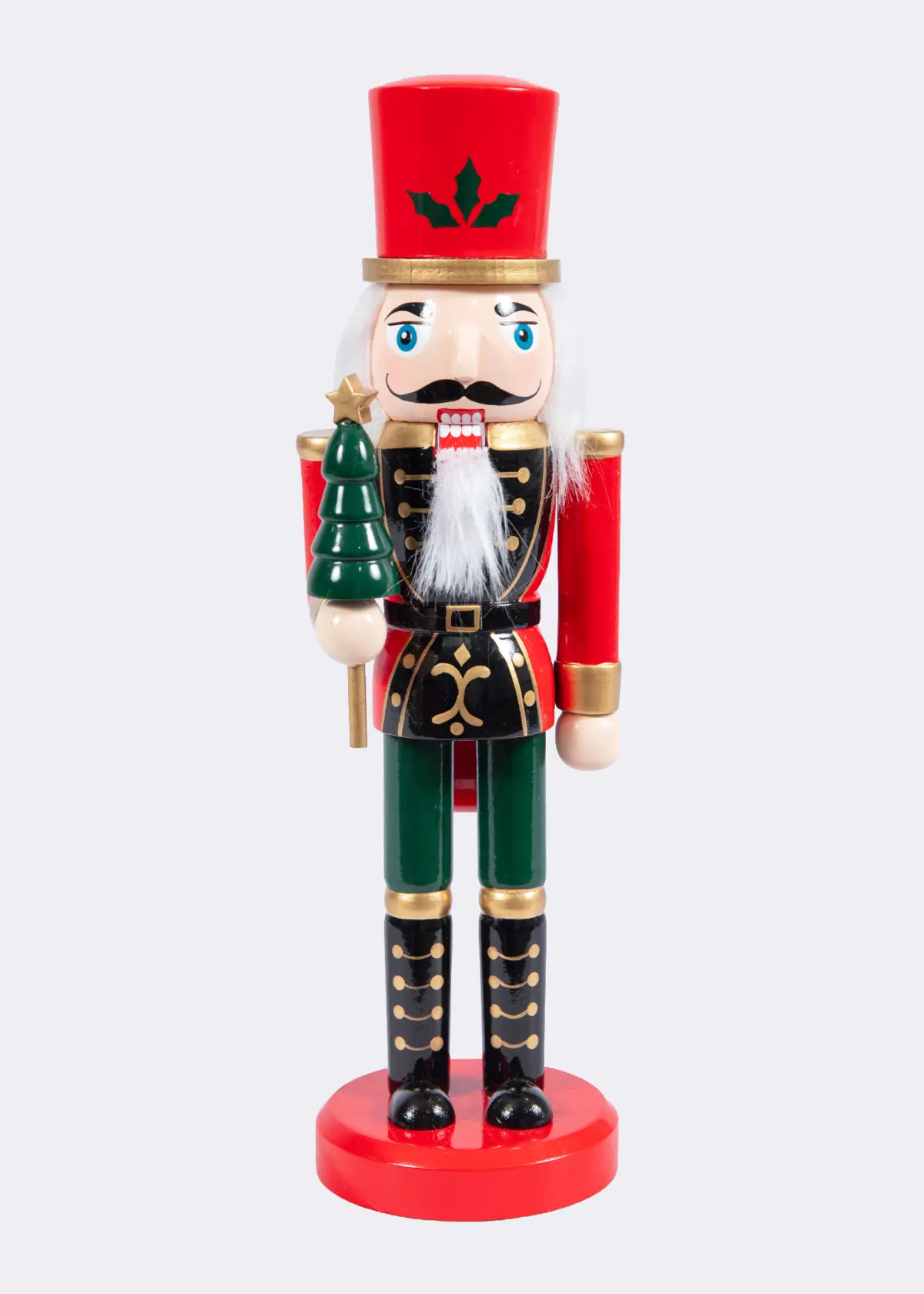 A photo of Red & Green Wooden Nutcracker Holding Christmas Tree 25cm