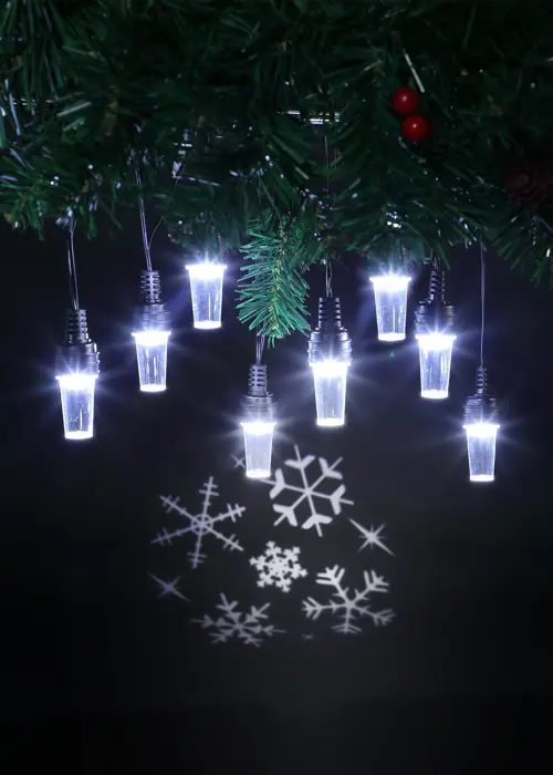 A photo of 8 White Snowflake Pattern Projector String Lights