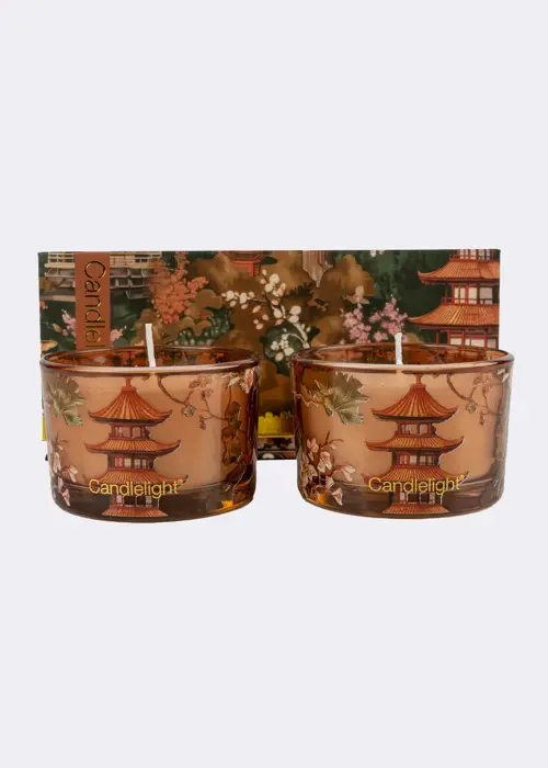 A photo of Set Of 2 Moroccan Red Cinnamon Candles