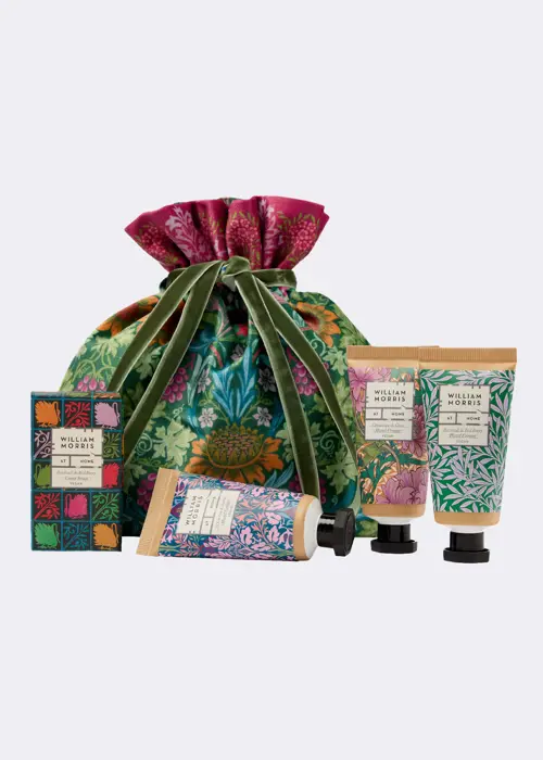 A photo of William Morris Sunflower Swan Velvet Pouch With Hand Creams