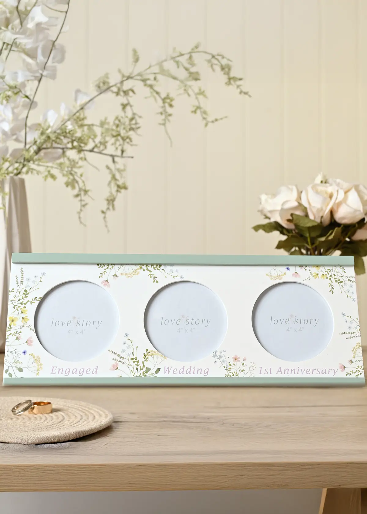 A photo of Love Story Wildflower Triple Photo Frame