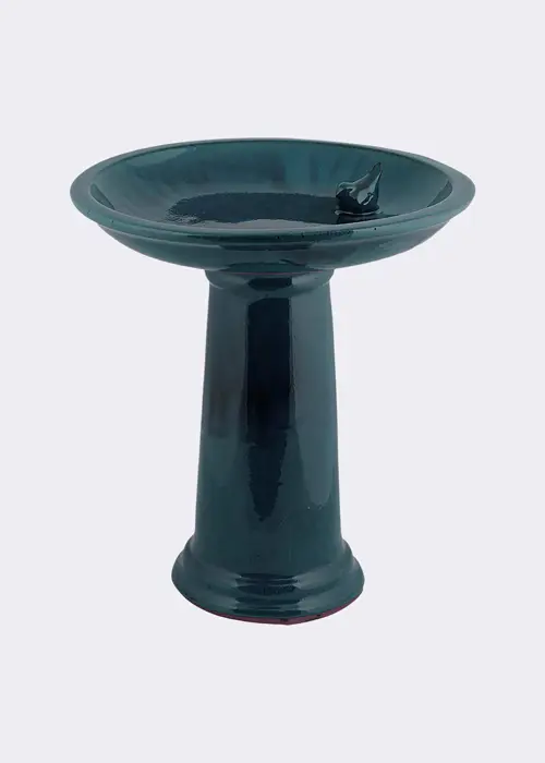 A photo of Ceramic Blue Bird Bath On Pedestal