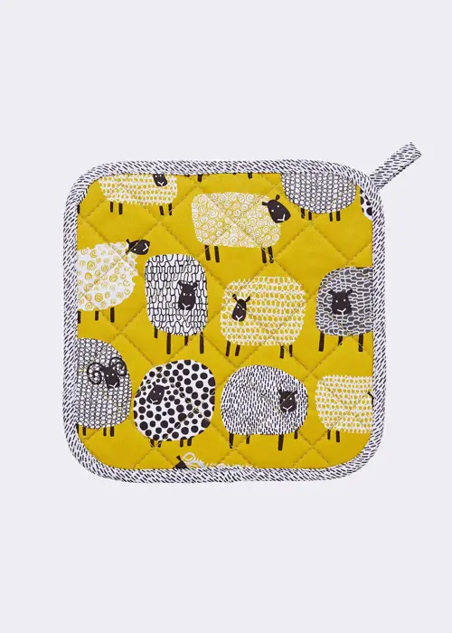 A photo of Dotty Sheep Cotton Pot Mat