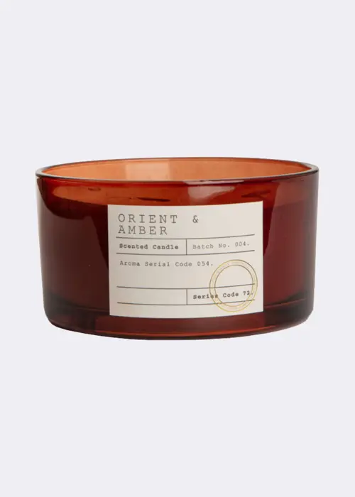 A photo of Orient & Amber Five Wick Candle
