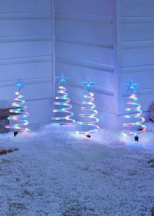 A photo of Set Of 4 Multicolour Swirl Stake Lights