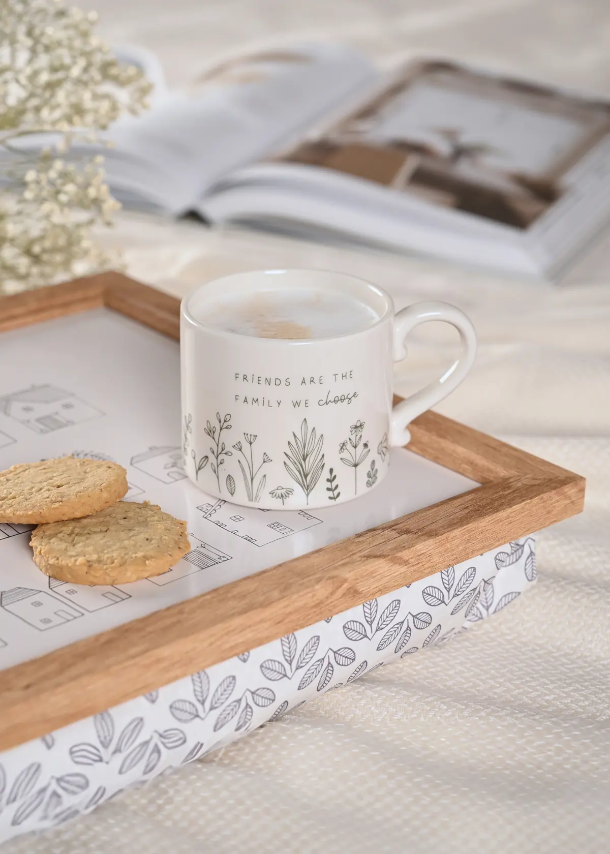 A photo of Friends Are Family Moment's Mug