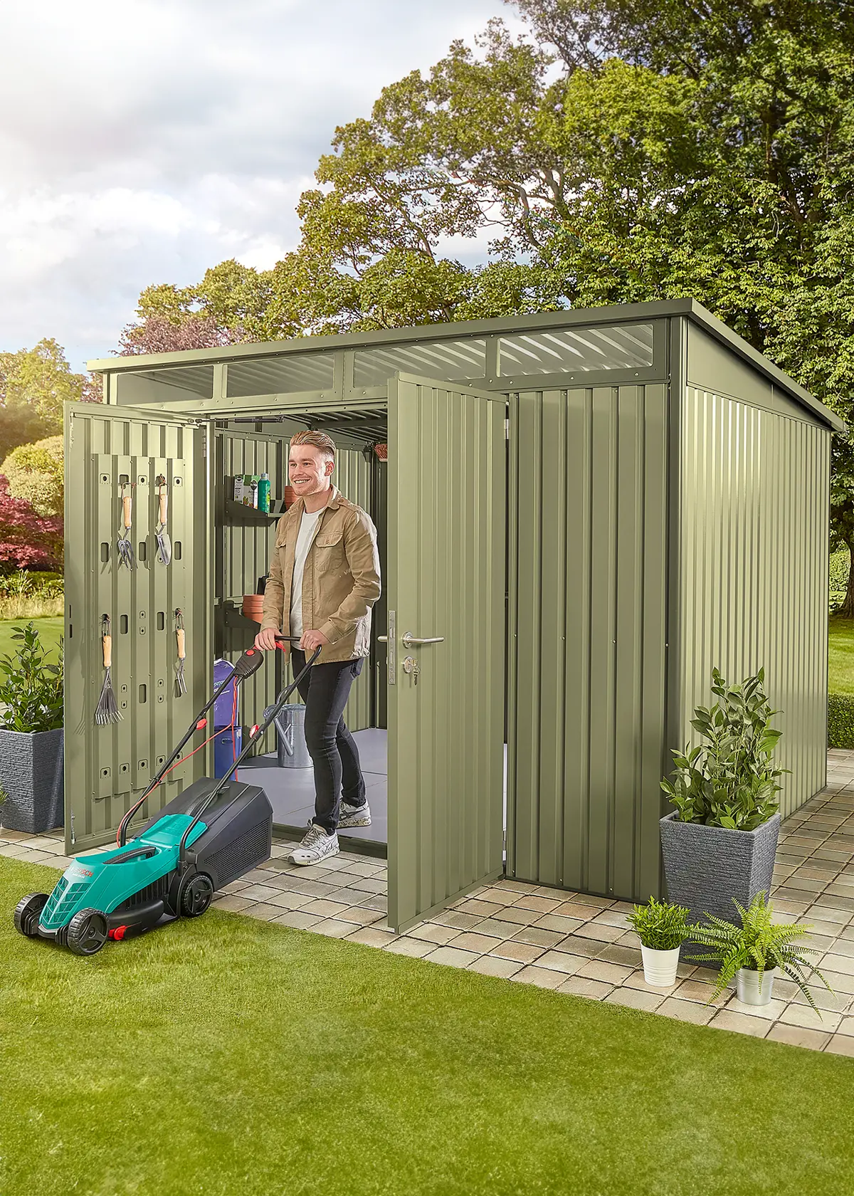 A photo of Hixon Garden Shed 2.4 x 1.84 x 2.13m Green