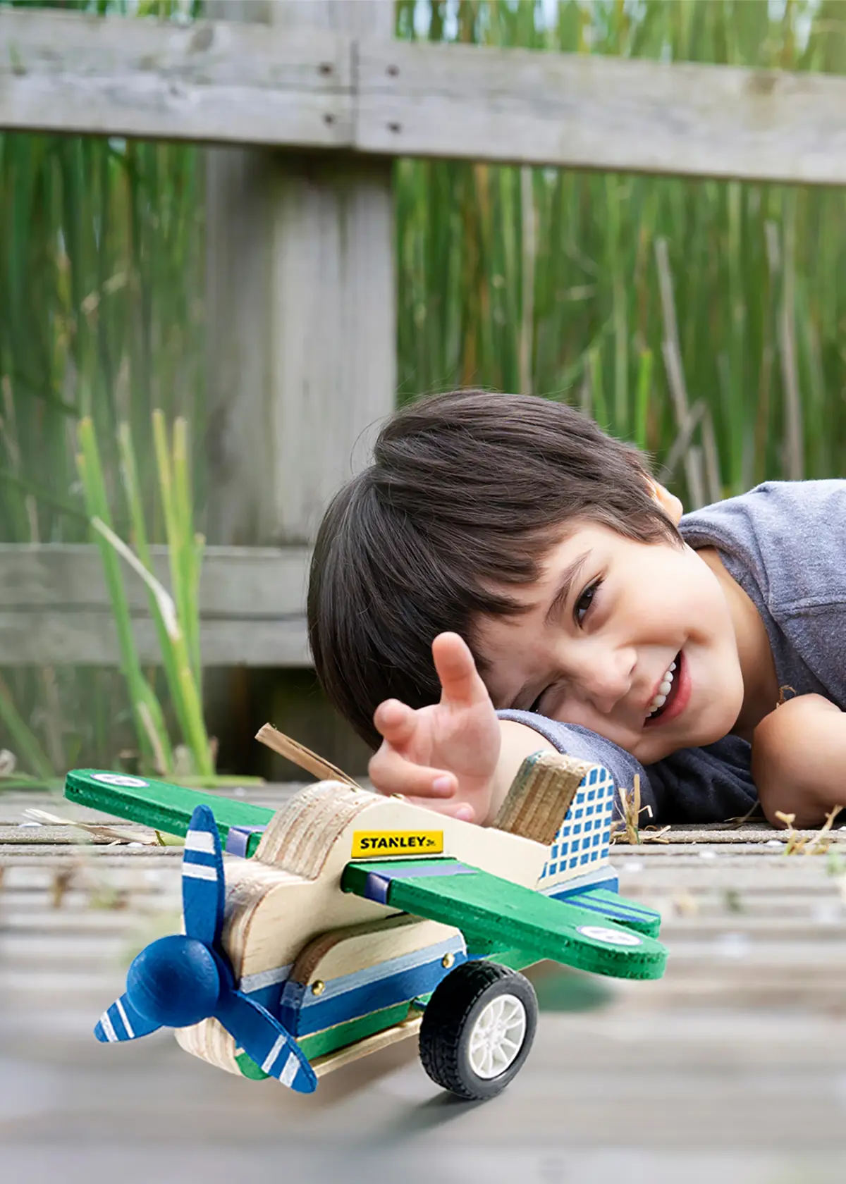 A photo of Stanley Jr. Pull Back Wooden Airplane Craft Kit