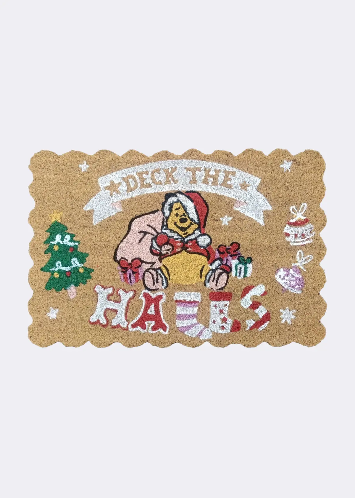 A photo of Winnie The Pooh Deck The Halls Coir Doormat 40x60cm