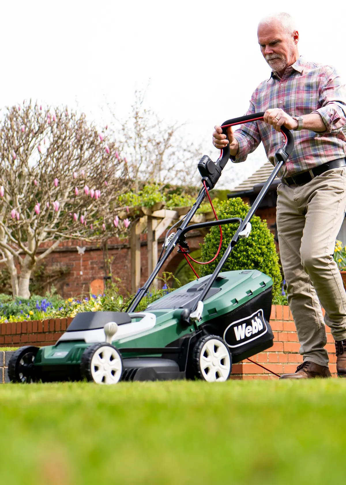 A photo of Webb Supreme 40cm (16") Electric Rotary Lawnmower with Rear