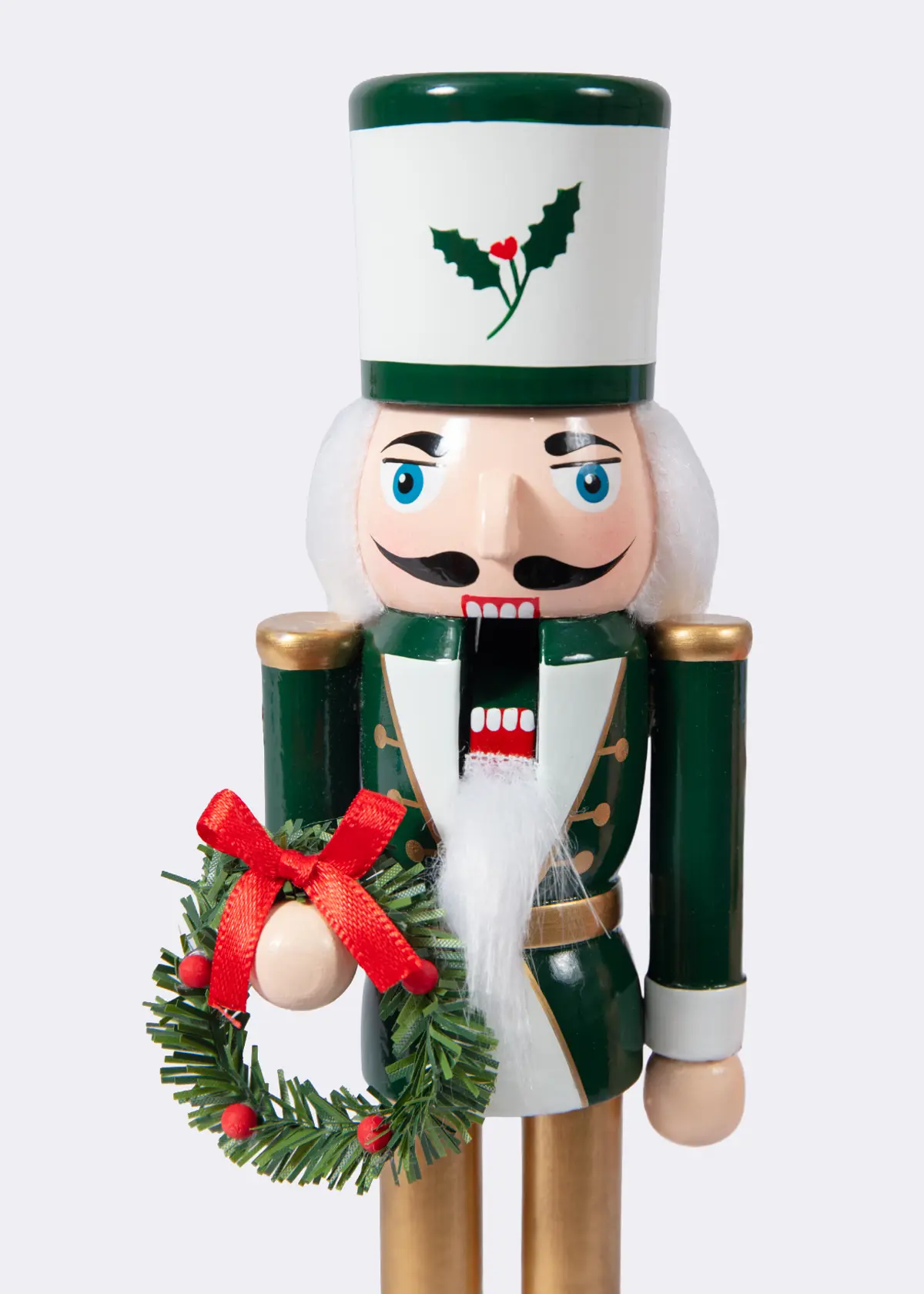 A photo of Green & White Wooden Nutcracker With Wreath 38cm
