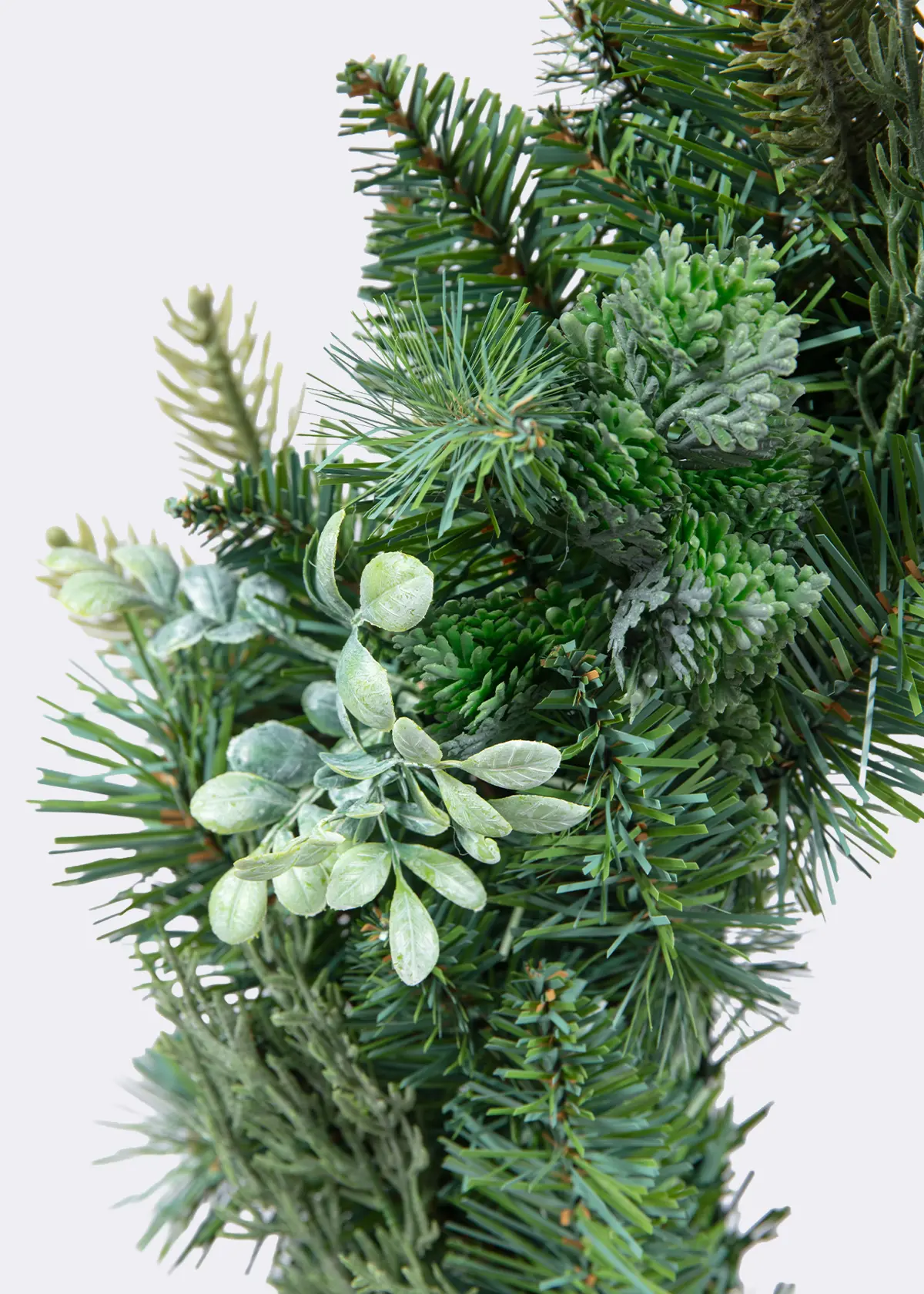 A photo of Mixed Greenery Artificial Wreath 60cm