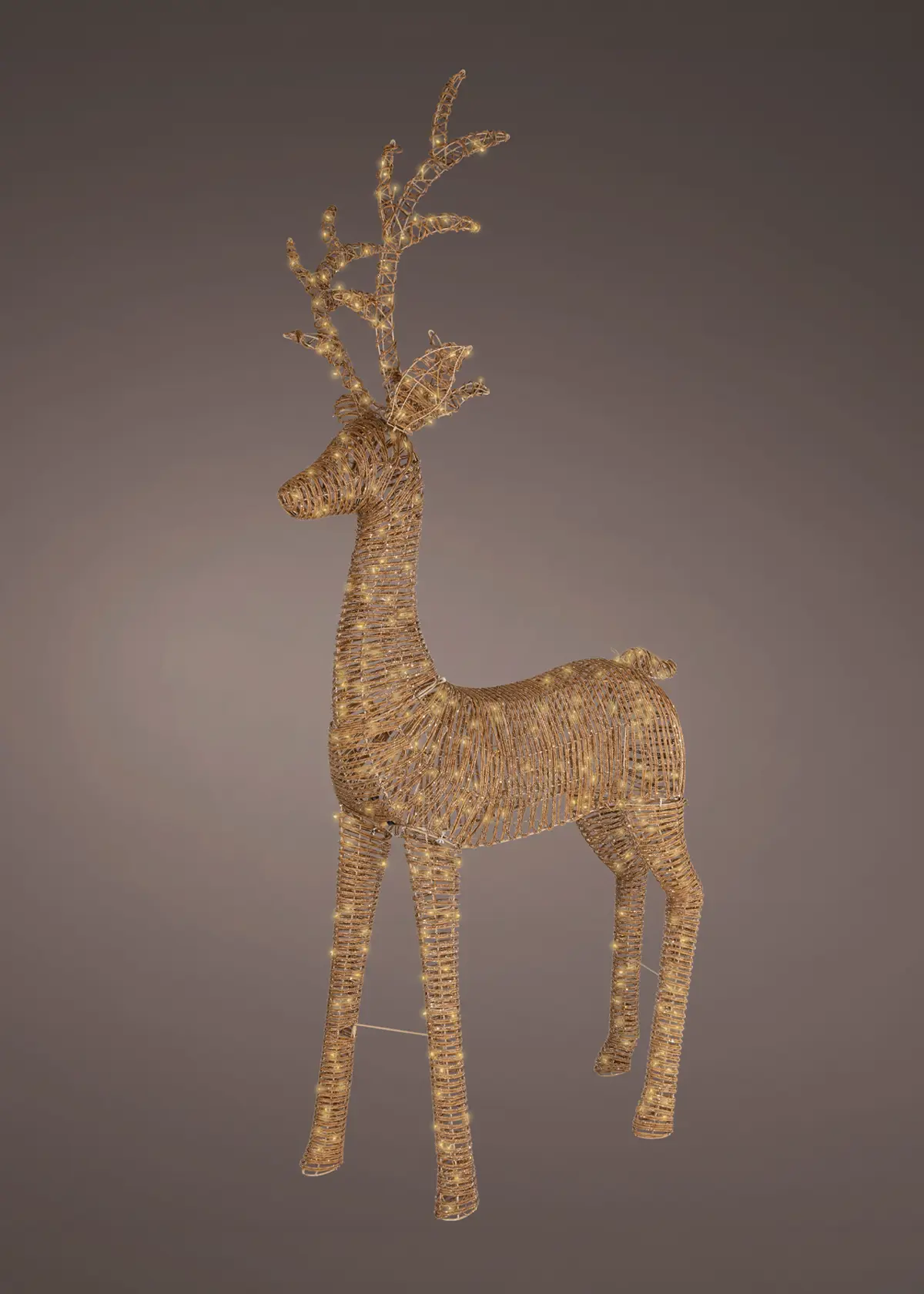 A photo of 2.7m Gold LED Wicker Reindeer With Flashing Effect Brown
