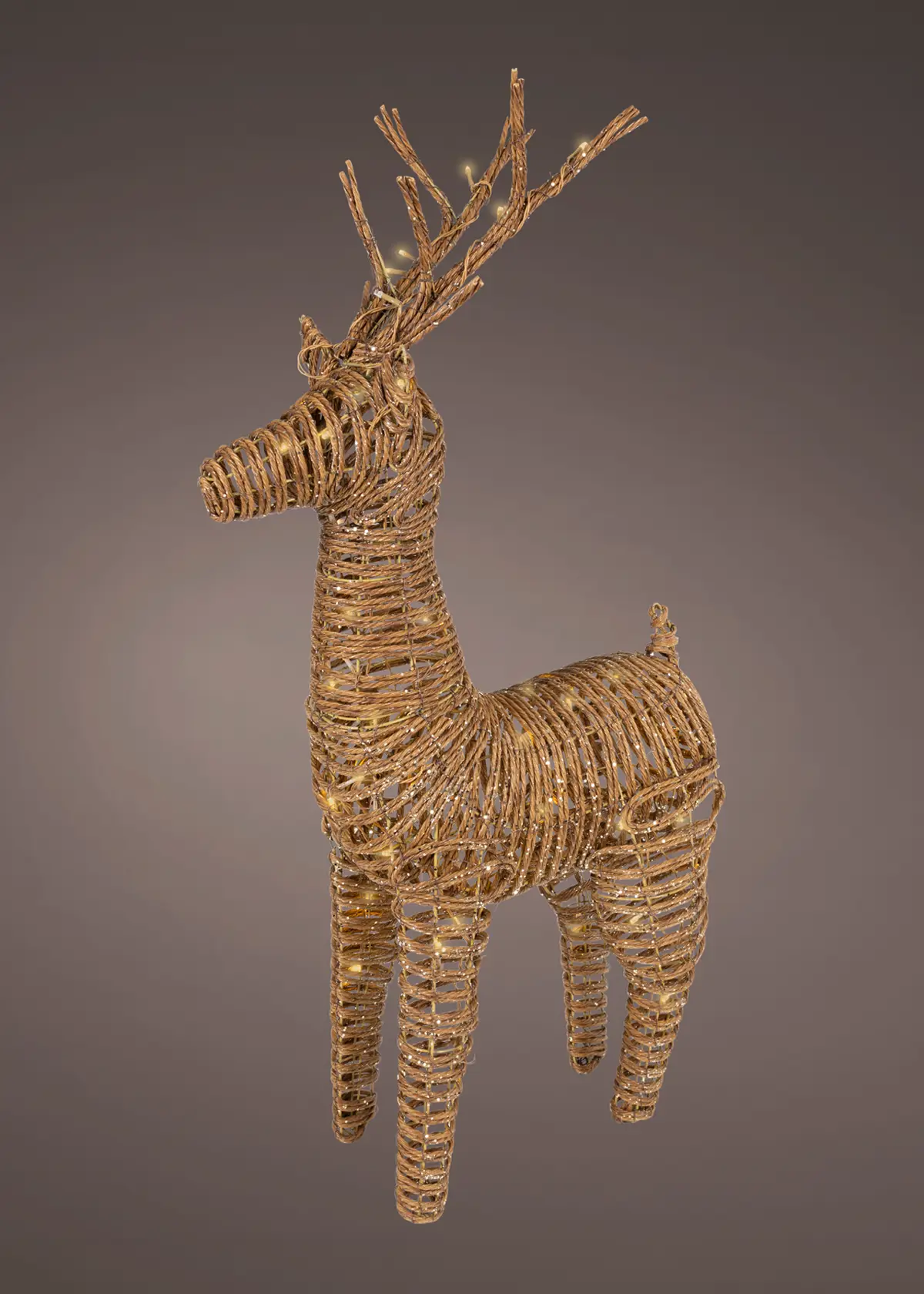 A photo of 1.04m Gold LED Wicker Reindeer With Flashing Effect Brown