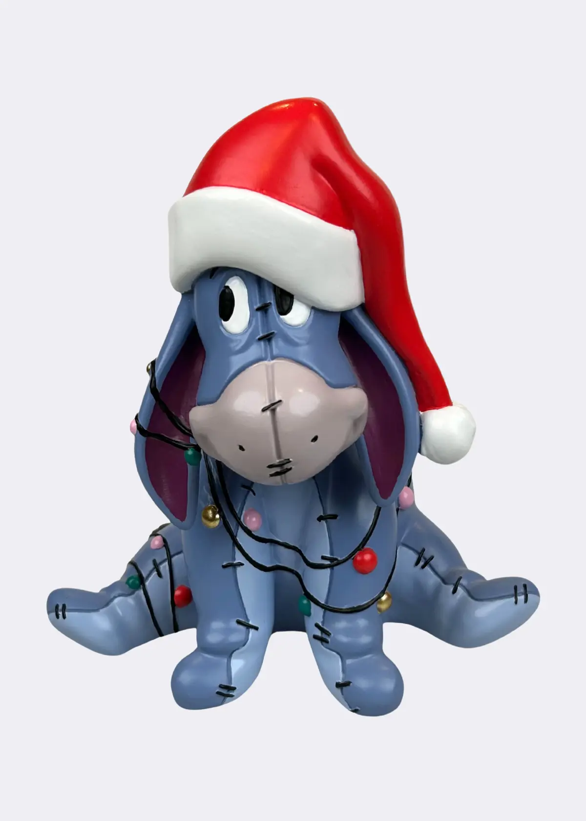 A photo of Disney Eeyore Festive Statue 20.5cm