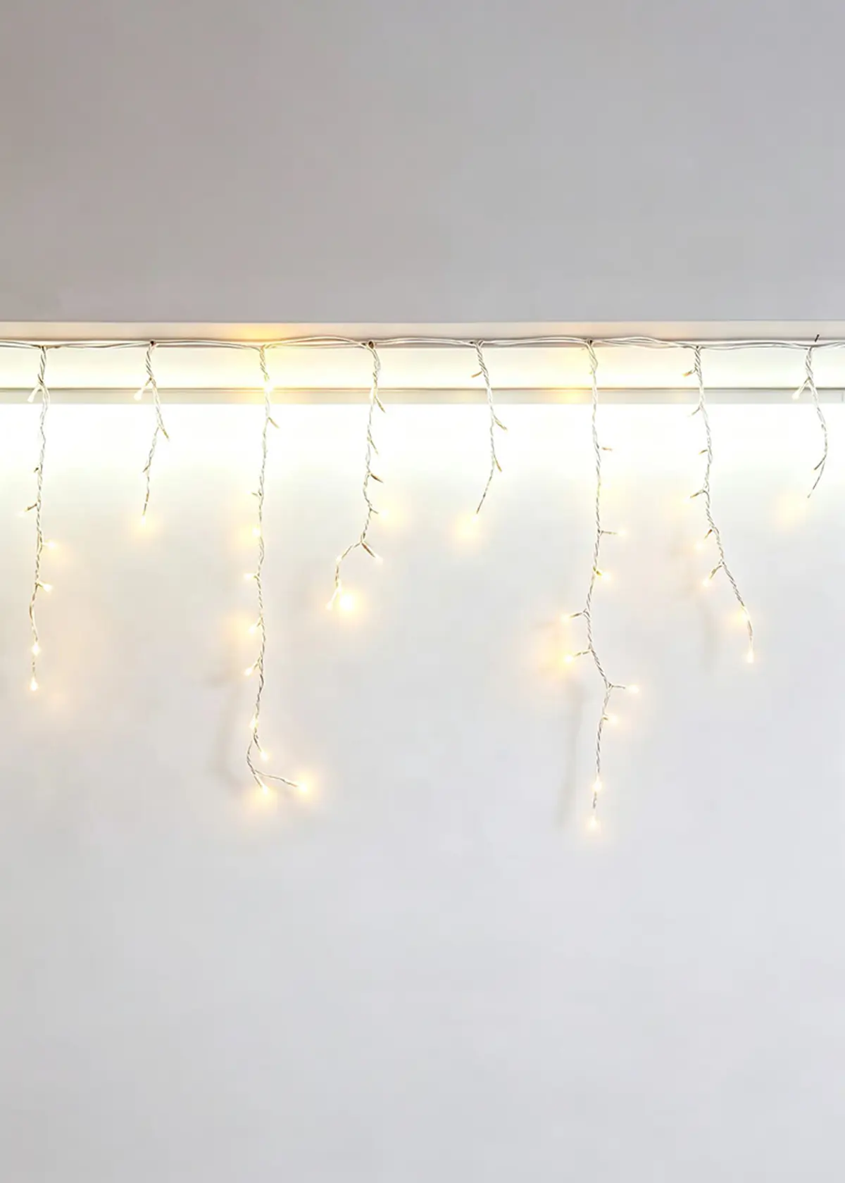 A photo of 240 Warm White Snowing Icicle Lights