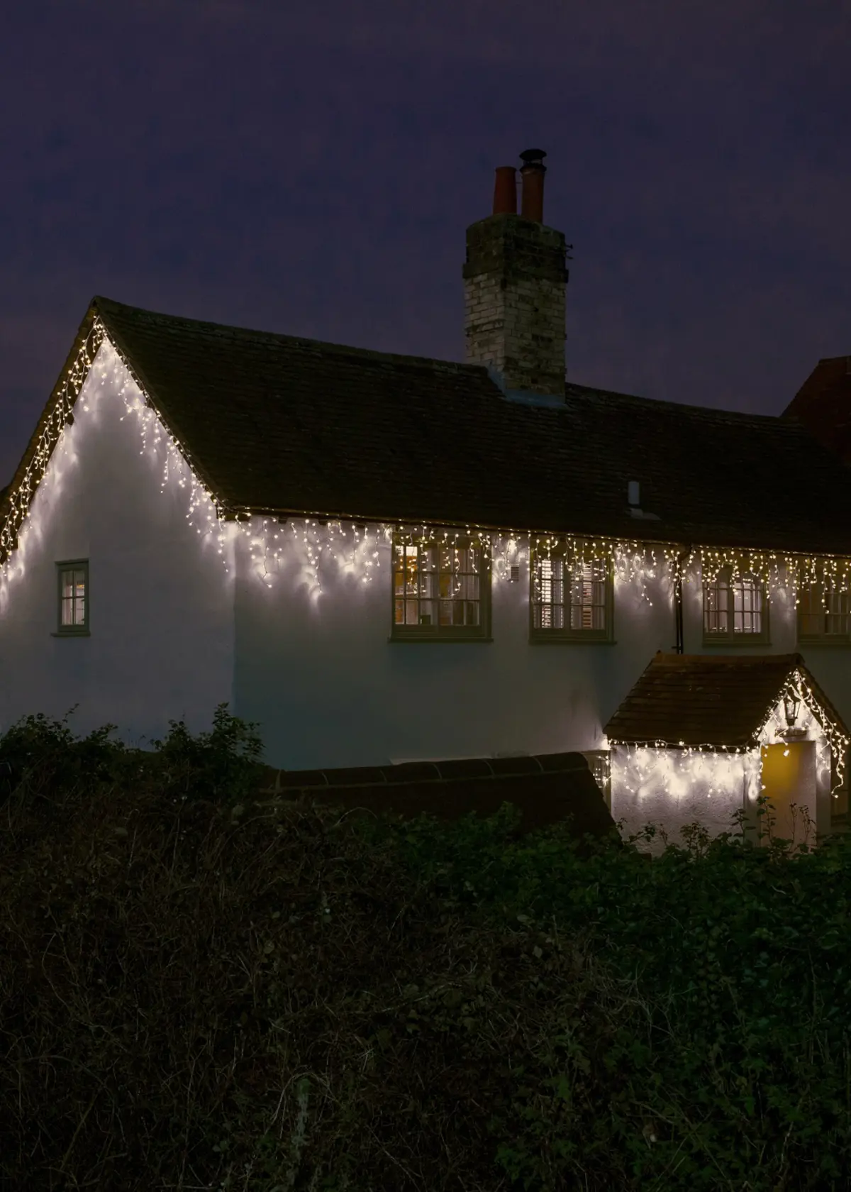 A photo of 240 White Snowing Icicles Lights 5m