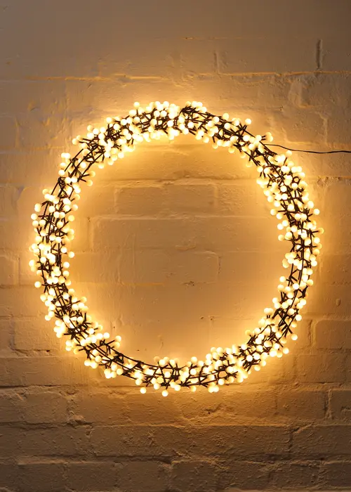 A photo of Warm White LED Berry Wreath Light 60cm