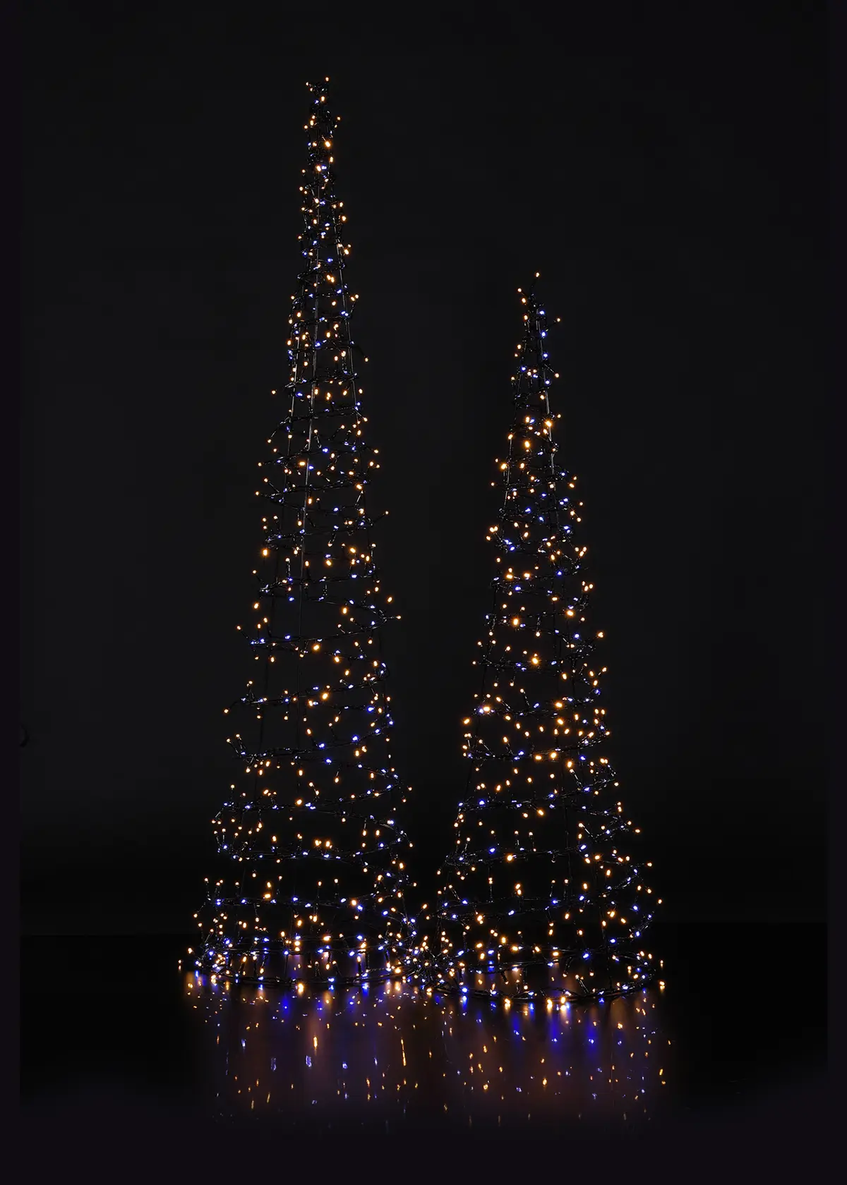 A photo of Set of 2 Twinkle-Effect Spiral Tree Lights 120cm & 90cm