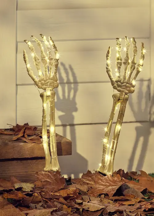 A photo of Set Of 2 Skeleton Hand Garden Stake Lights