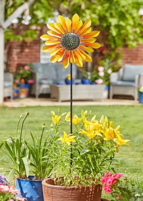 A photo of Helios Sunflower Wind Spinner