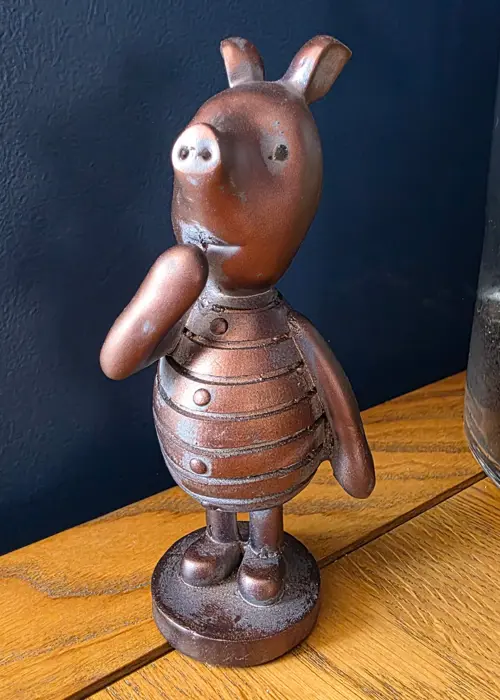 A photo of Piglet Resin Garden Ornament 15cm Bronze