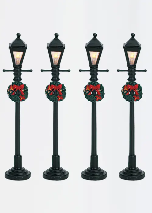 A photo of Set Of 4 Lemax Gas Lantern Street Lamps
