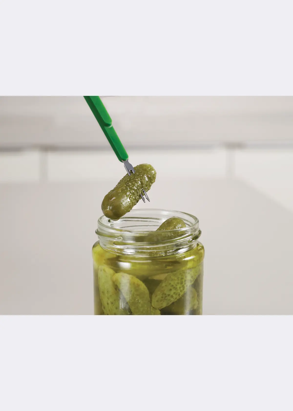 A photo of Scoop & Pick Tool Green