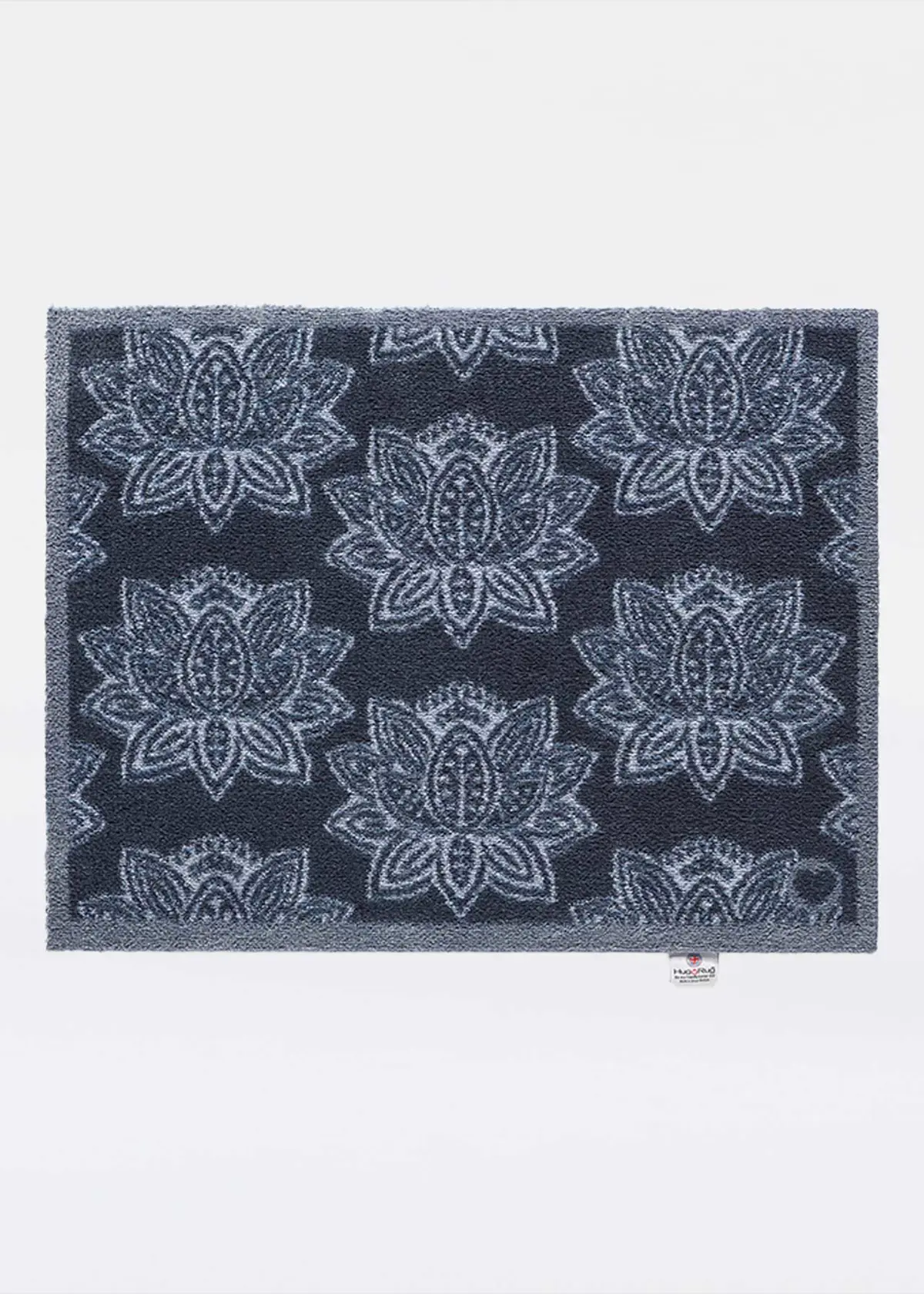 A photo of RHS Woodblock Hug Rug 65 x 85cm