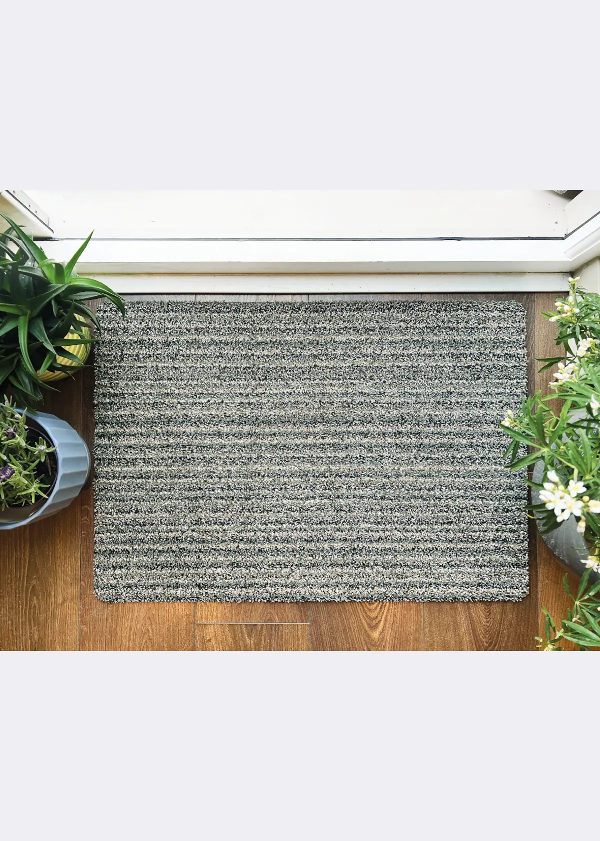 A photo of Dobbies Cotton Candy Sage Indoor Mat 50x75cm