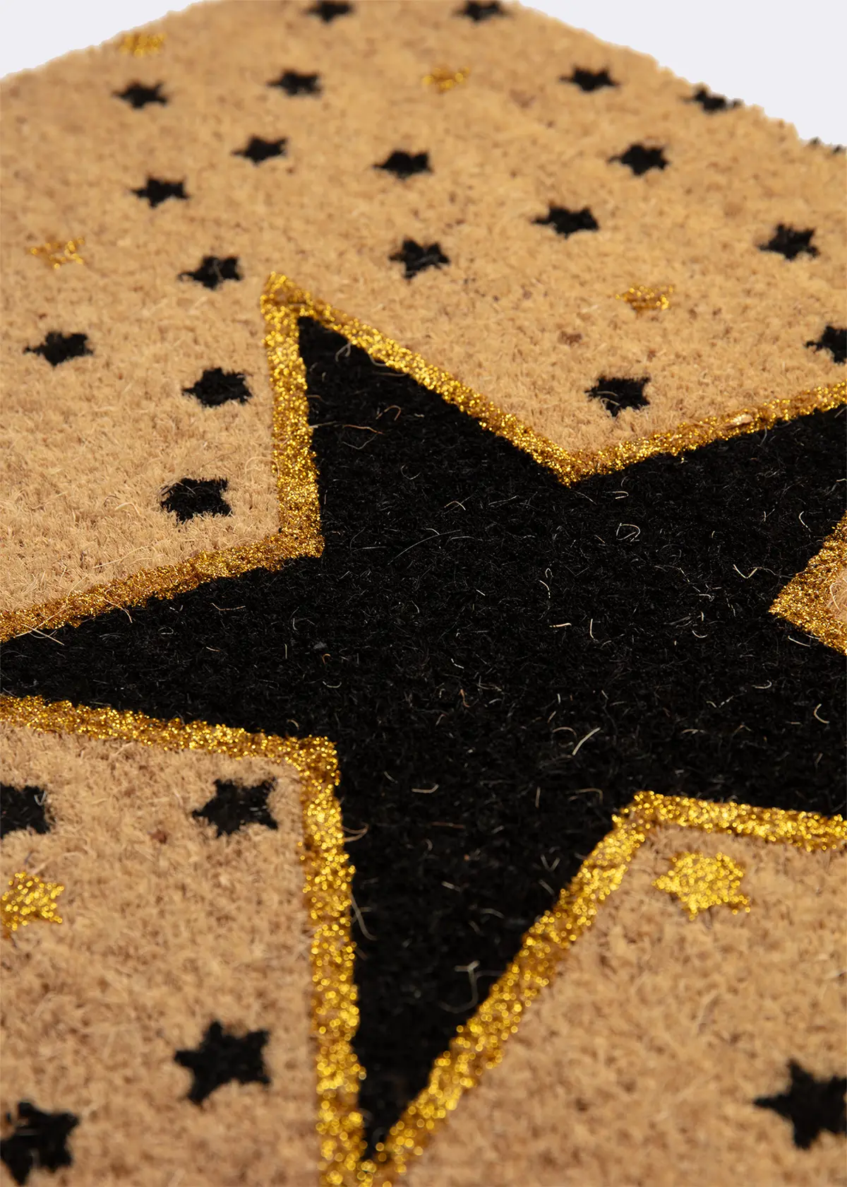 A photo of 'Star' Printed Doormat 60x40cm