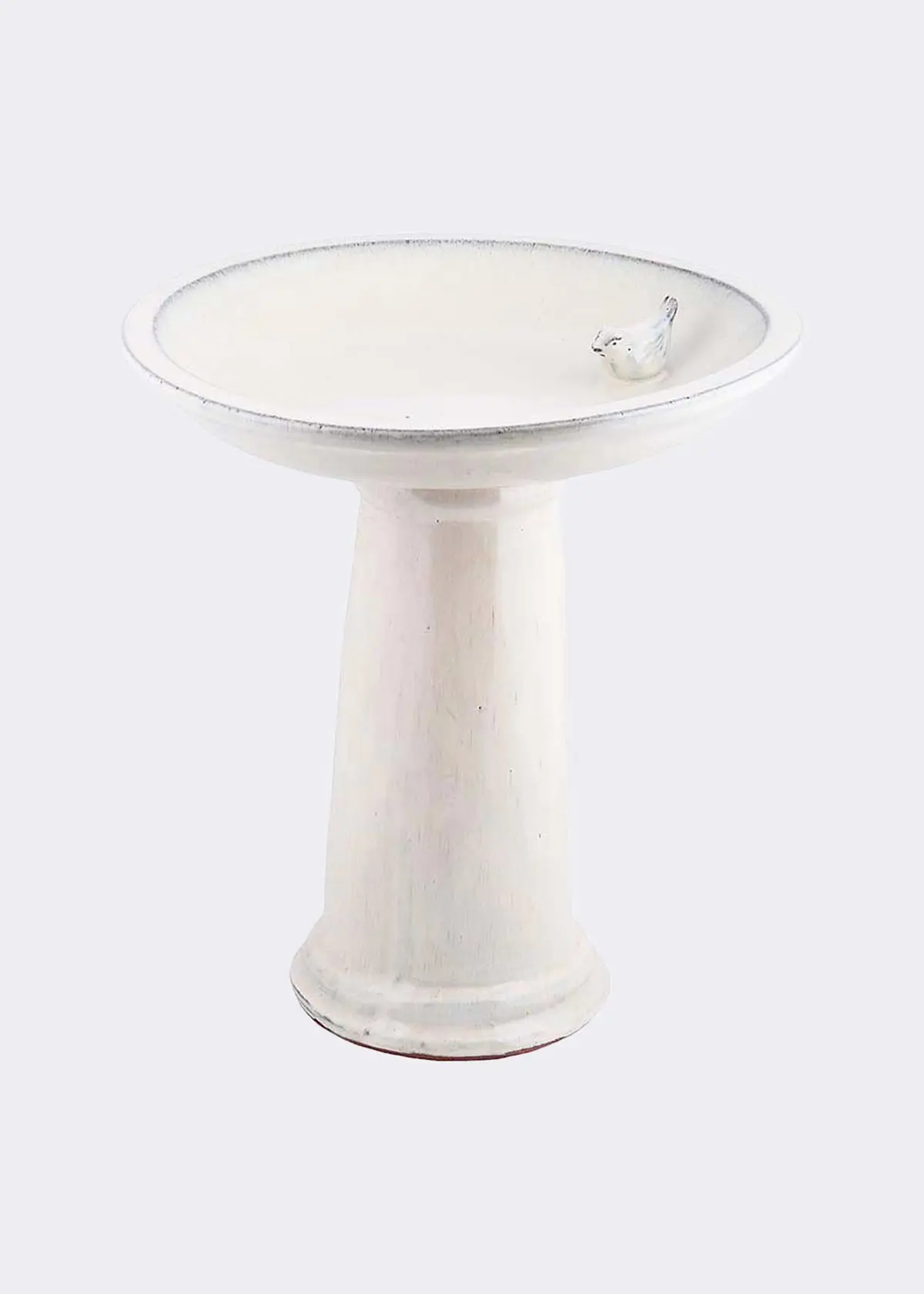 A photo of Fallen Fruits Ceramic Cream Bird Bath On Ped