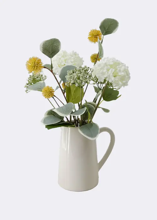 A photo of Faux Mixed Faux Floral Arrangement