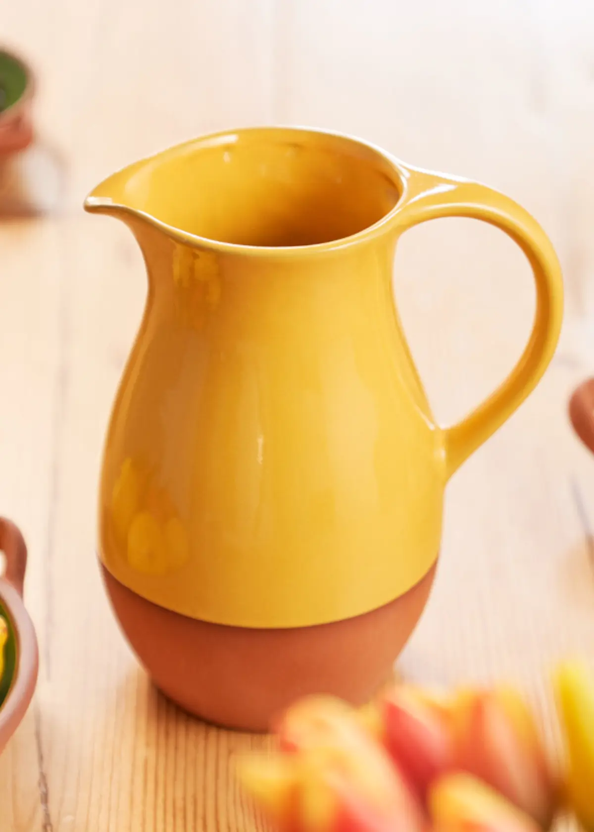 A photo of Sintra Glazed Terracotta Jug Ochre