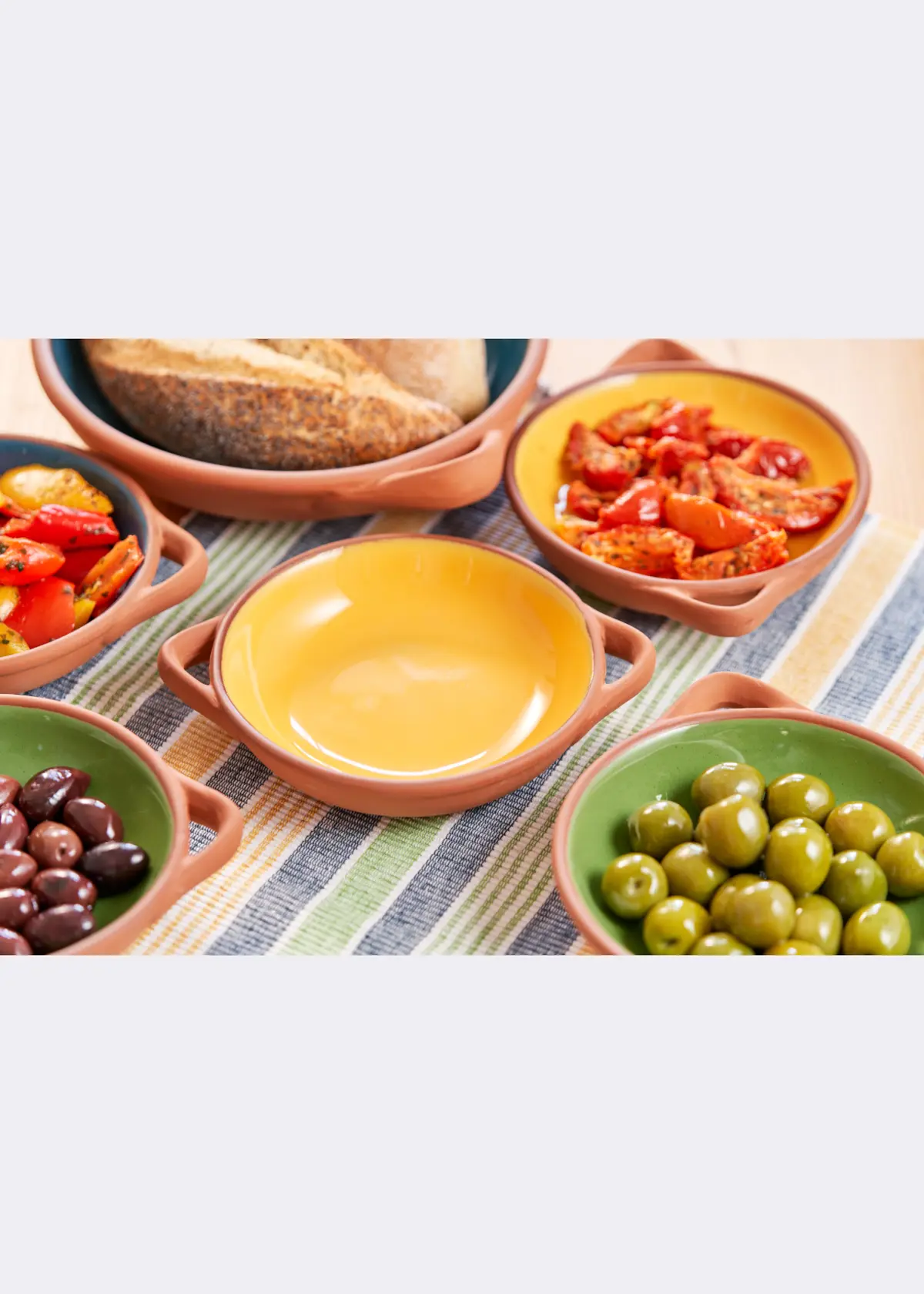 A photo of Sintra Small Glazed Terracotta Tapas Dish Ochre