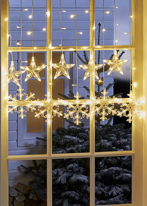 A photo of 10 Snowflake Indoor Curtain String Lights