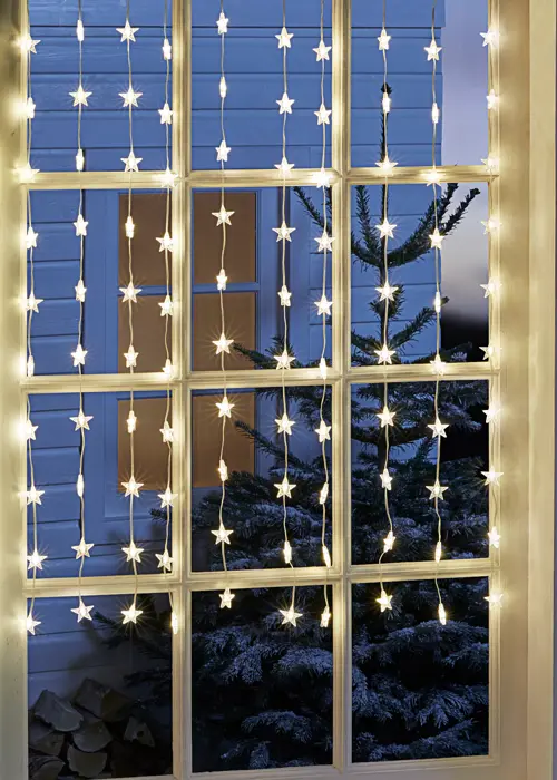 A photo of Warm White Star Curtain Lights