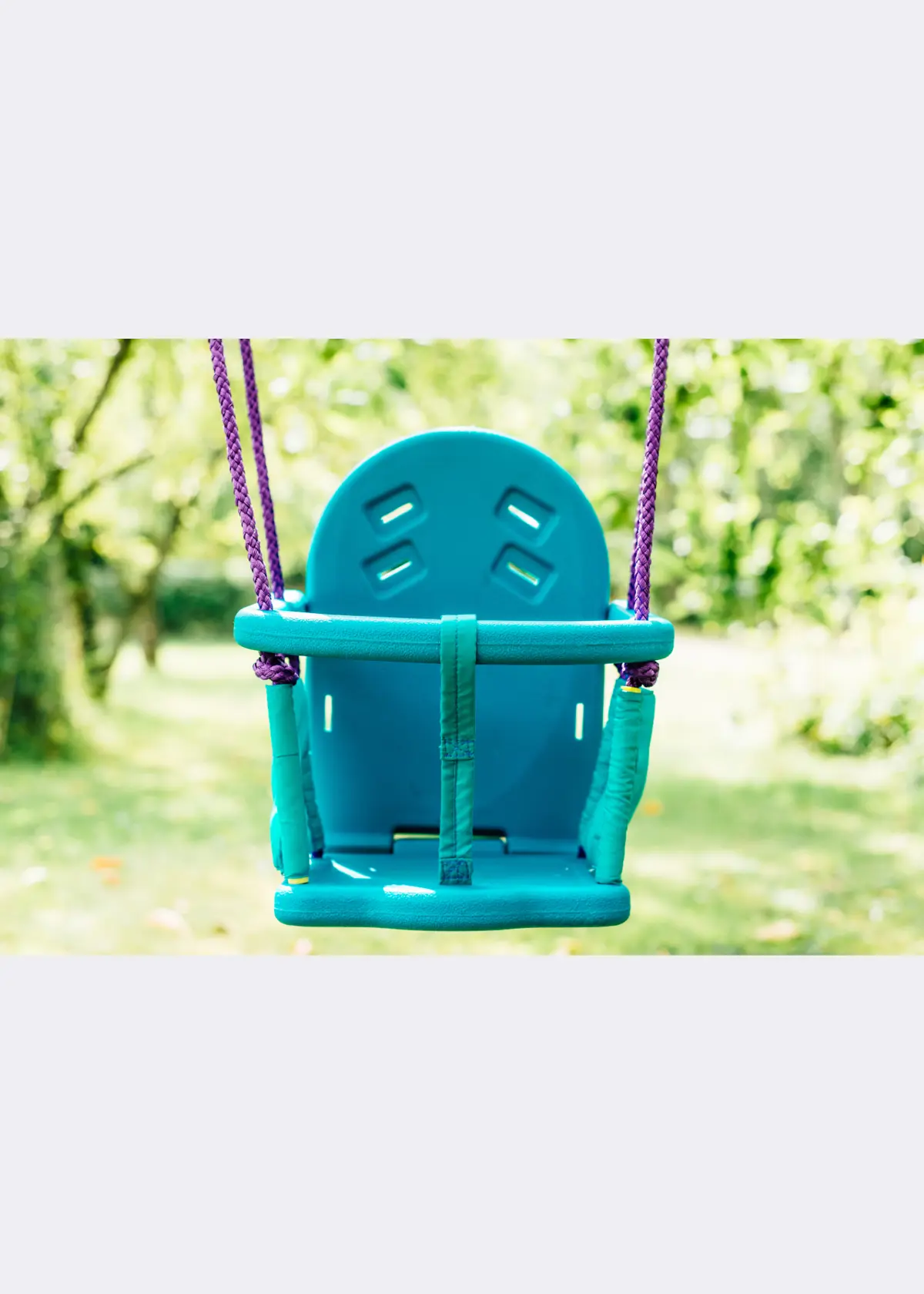 A photo of Plum® 2 in 1 Swing Set Purple & Teal
