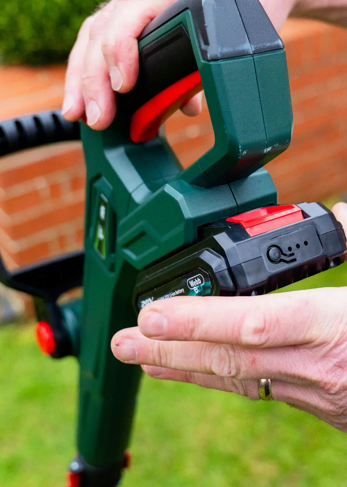 A photo of Webb 20V 30cm Cordless Linetrimmer with Battery & Charger