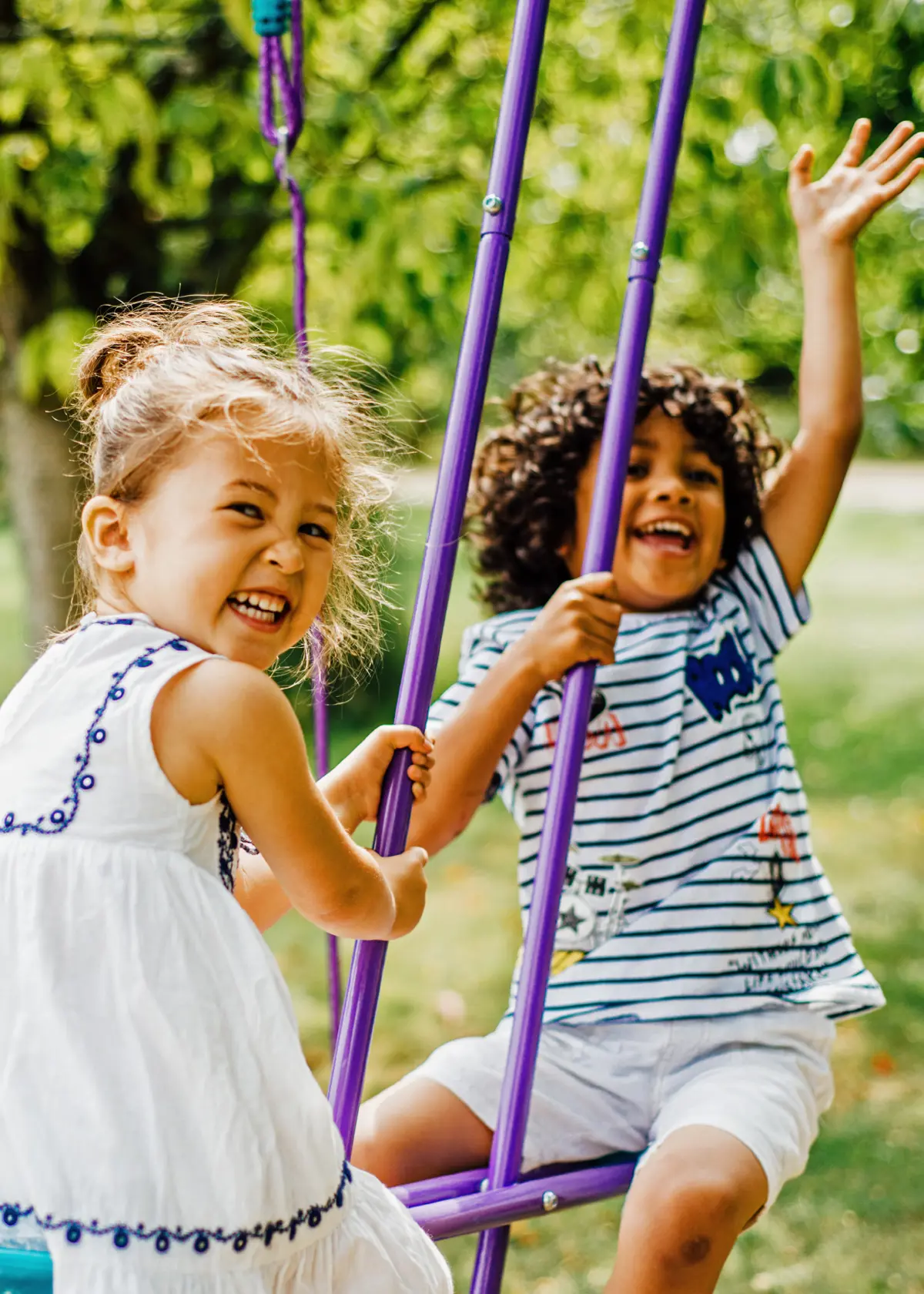 A photo of Plum® Jupiter® Double Swing & Glider Set Purple & Teal