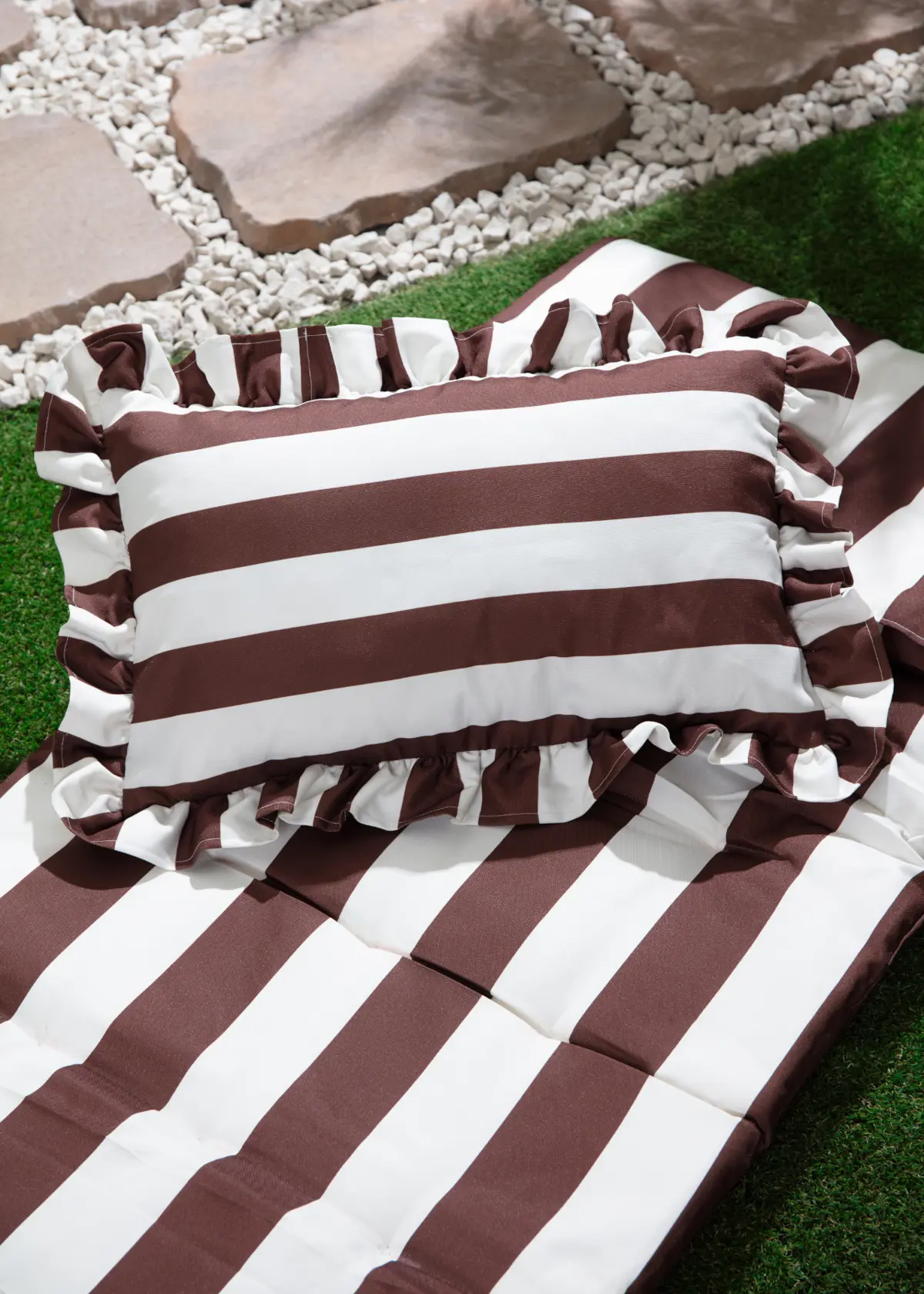 A photo of Outdoor Oasis Stripe Outdoor Cushion