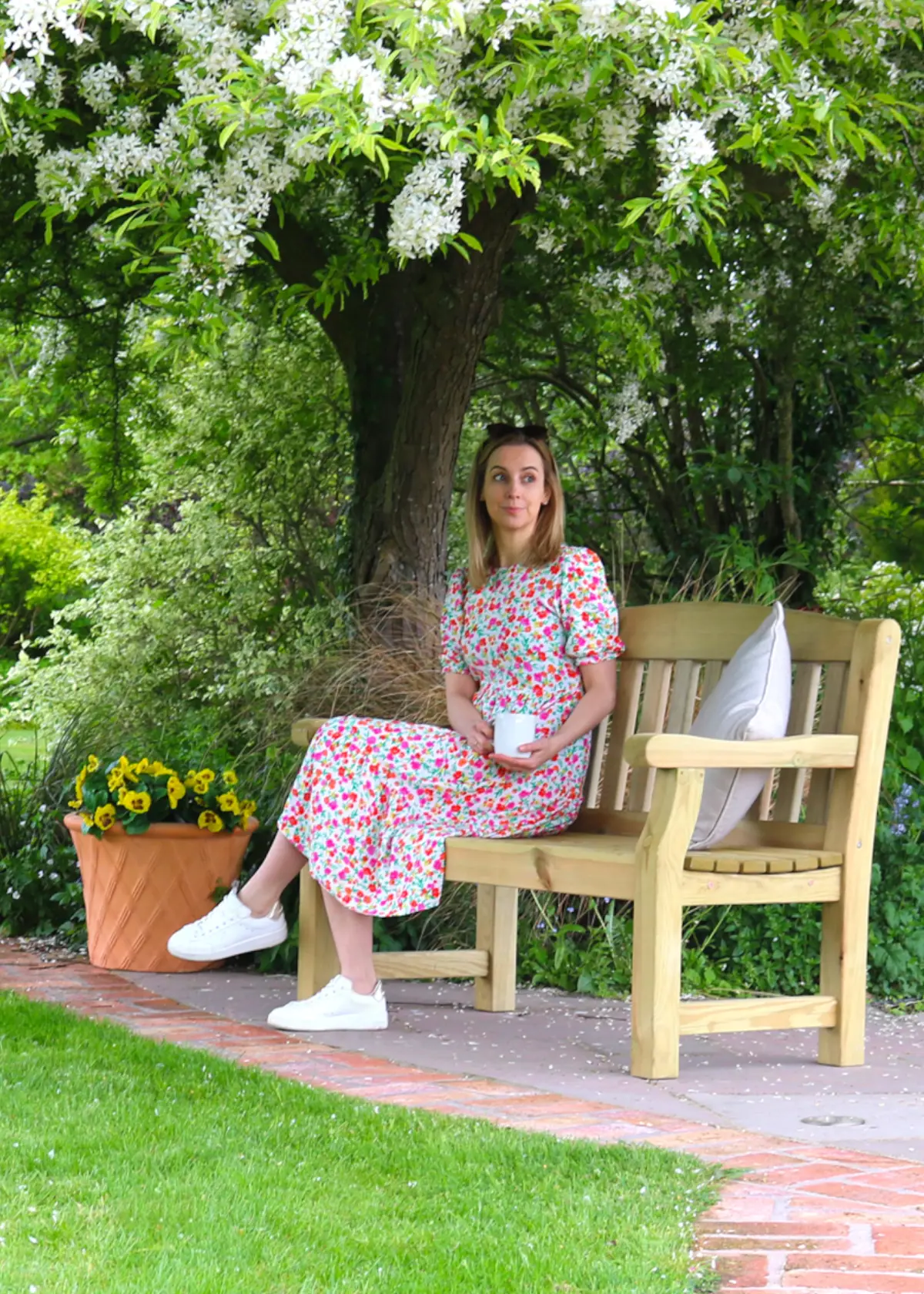 A photo of Emily 2 Seater Wooden Garden Bench