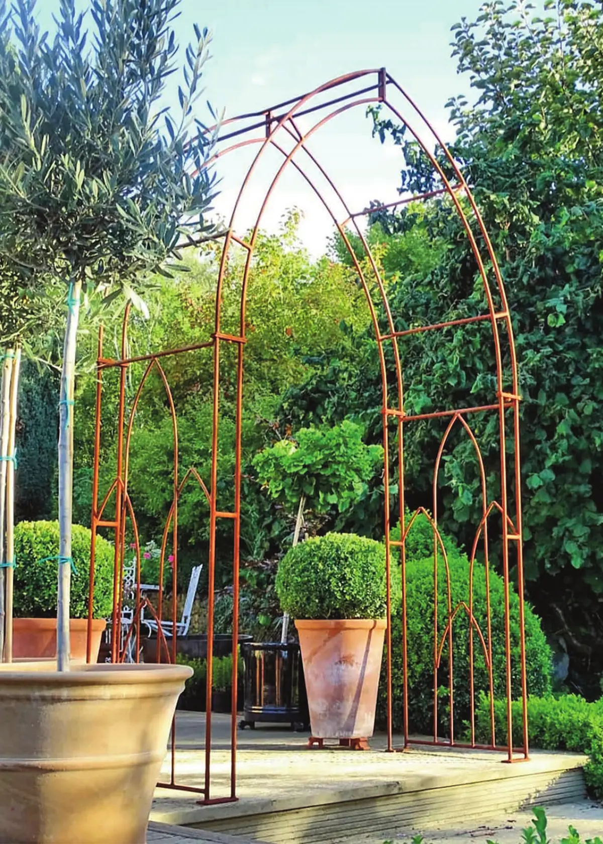 A photo of Gothic Bare Metal Garden Arch with Ground Spikes
