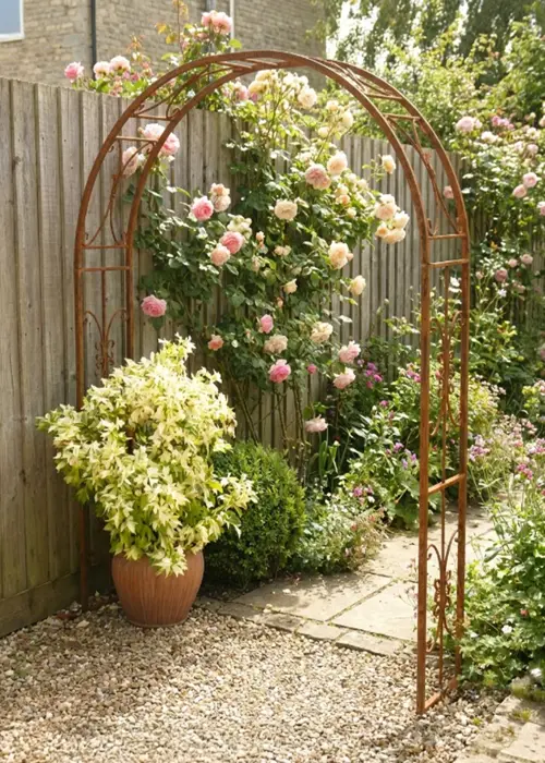 A photo of Buckingham Bare Metal Garden Arch with Ground Spikes